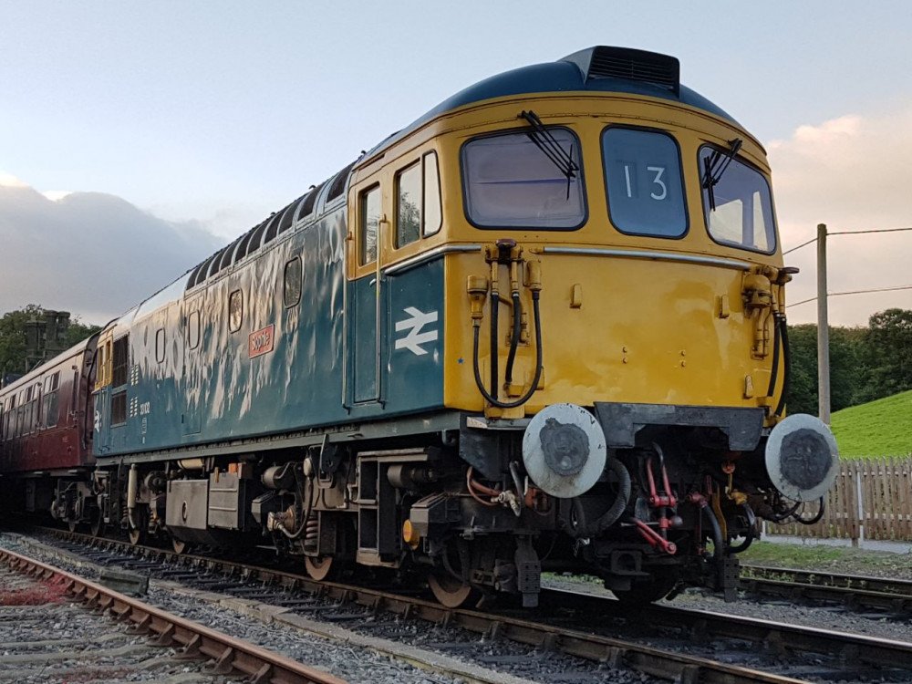 33102 stands at the head of its train at Cheddleton awaiting departure to Consall