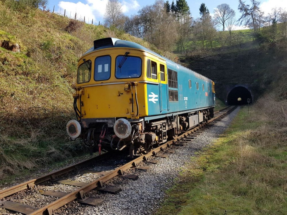 33102 stands in front of Cheddleton Tunnel as it runs round its train at Leekbrook Junction
