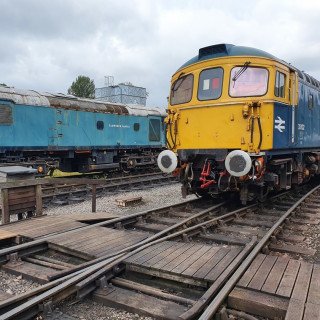 33102 sits in waiting next to Class 25 Tamworth Castle