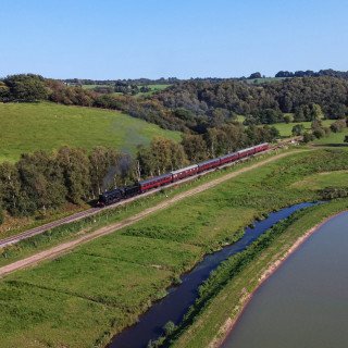With the new lakes in view 5197 powers towards Cheddleton as she warms up to attack the climb to Ipstones