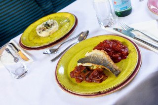 Mid Weeks Sea Bass with Tomatoed and Chorizo Sauce and opposite is the Wild Mushroom Risotto