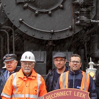 Just some of the team of volunteers stand proud at the end of the extension with 5197 and her train