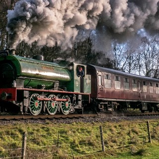 Whiston the steam engine get in his strind as he pulls the train onto the long straight coming to Cheddleton