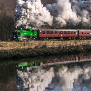 Polish Tank 'Hotspur' is seen hauling the three coach shuttle train on the Saturday of the gala